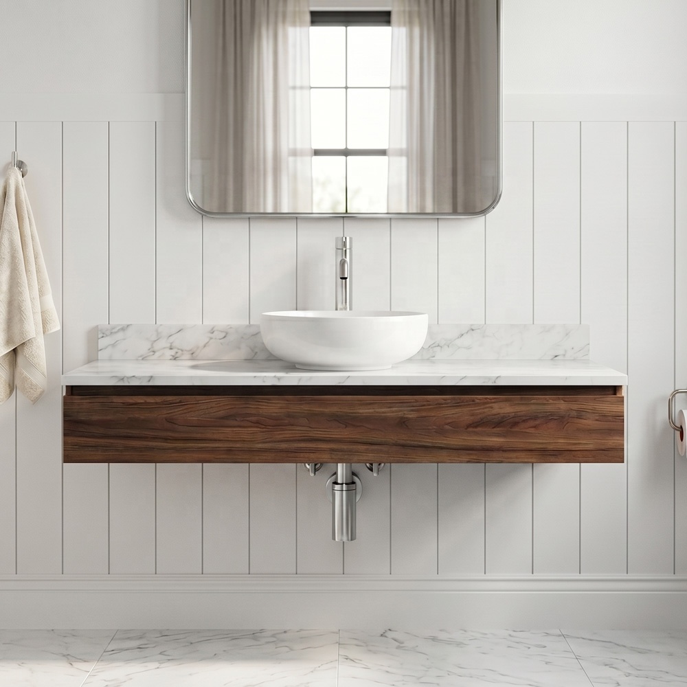 Renovated bathroom with a wall-hung basin and AERLO bottle trap